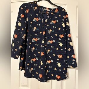 Floral on navy blouse